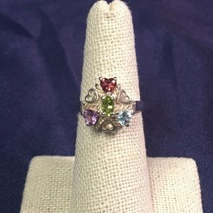 Silver ring with heart stones